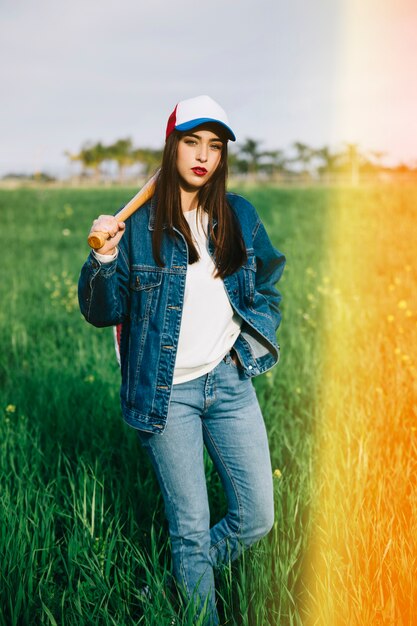 Young woman staying in sunlight