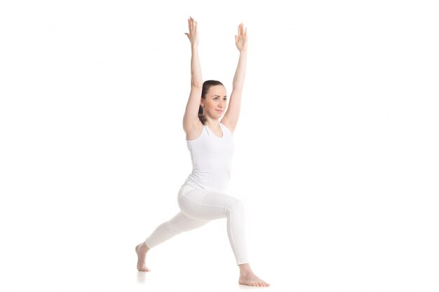 Young woman stretching her arms and legs