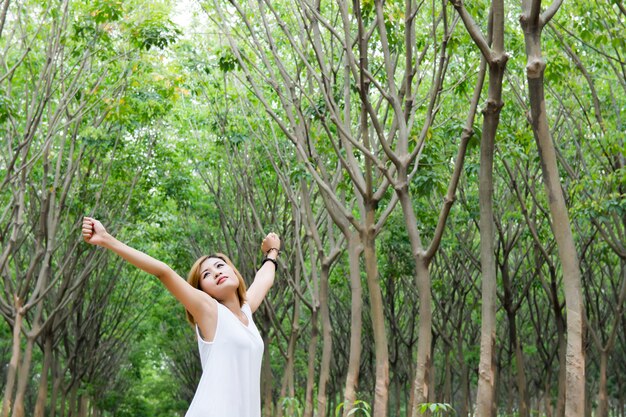 Young woman stretching her arms