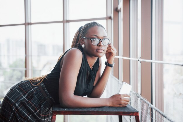 A young woman in stylish clothes.