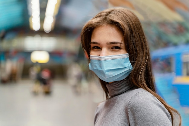 Young woman in a subway station