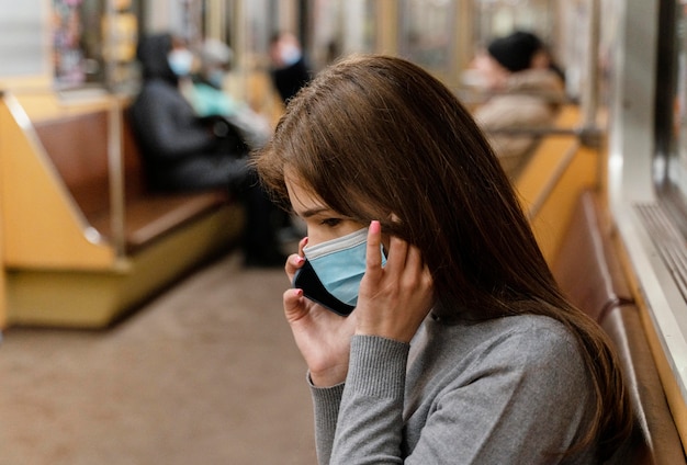 Young woman in a subway station