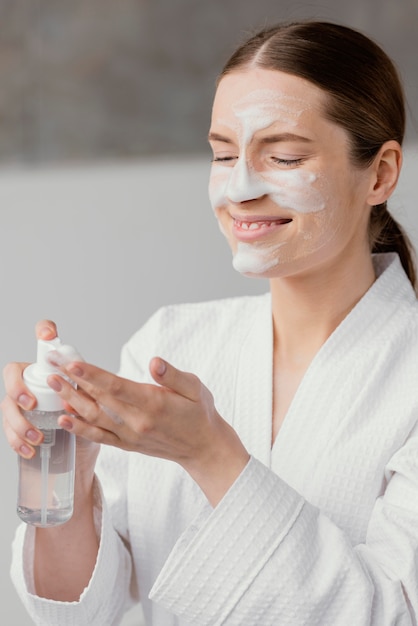 Young woman taking care of herself at home