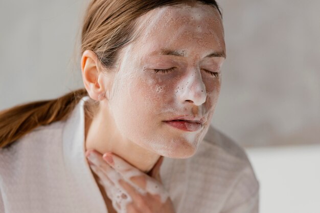 Young woman taking care of herself at home