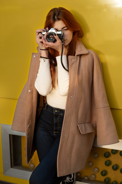 Young woman taking photos