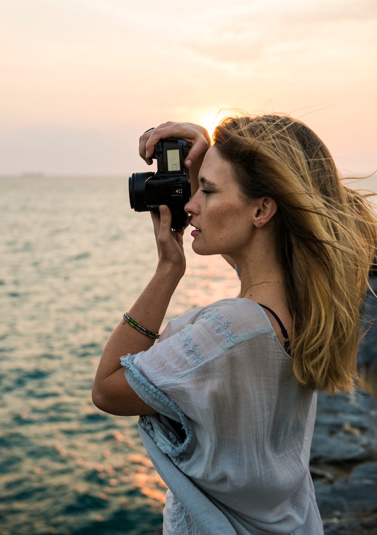 Free Photo young woman taking pictures concept