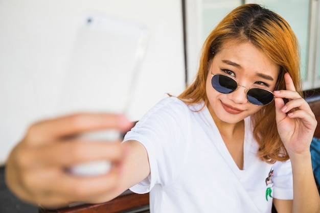 Young woman taking selfie 