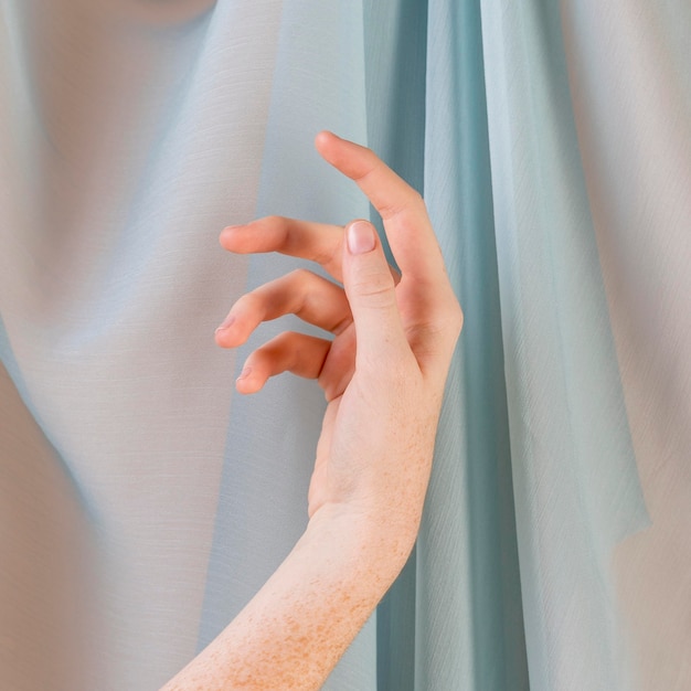 Young woman teaching sign language