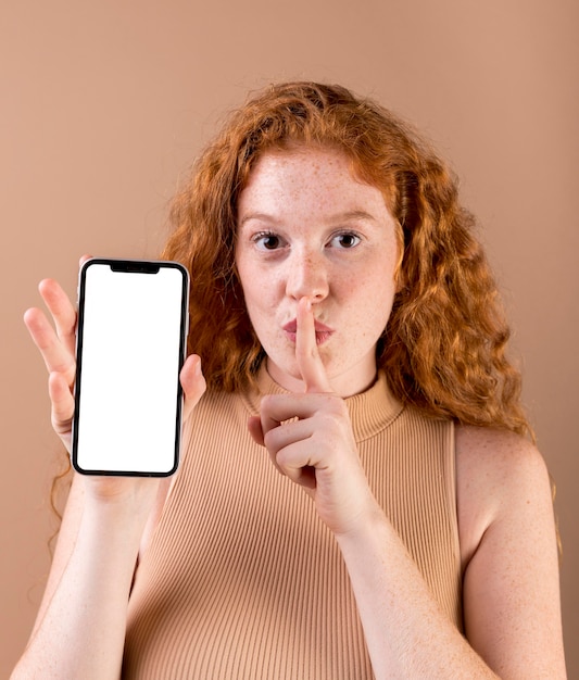 Free photo young woman teaching sign language