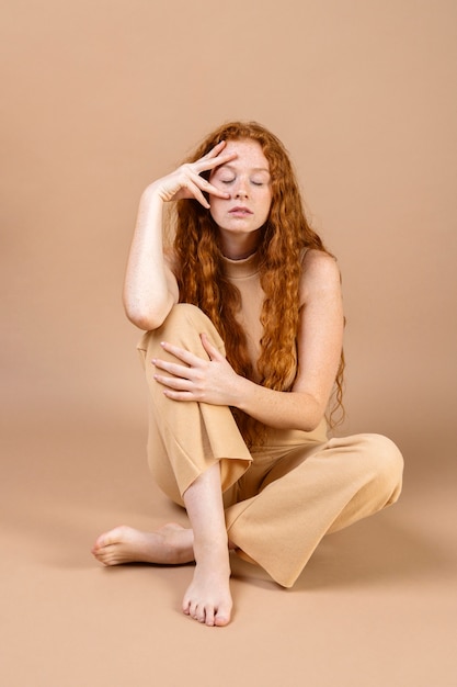 Young woman teaching sign language