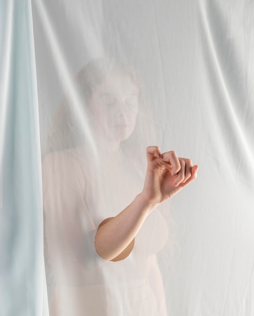 Young woman teaching sign language