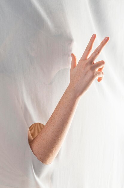 Young woman teaching sign language