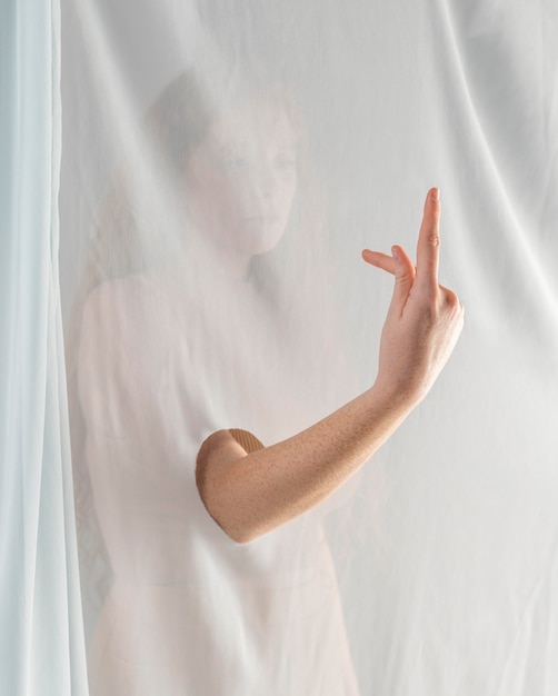 Young woman teaching sign language