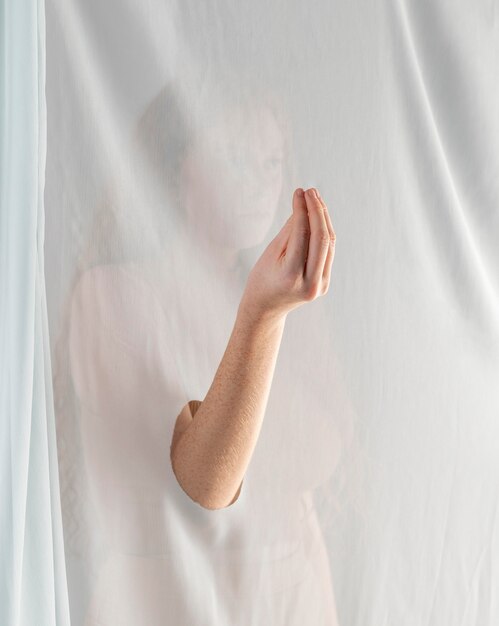 Young woman teaching sign language