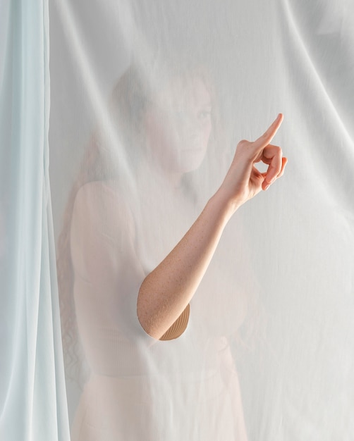 Young woman teaching sign language