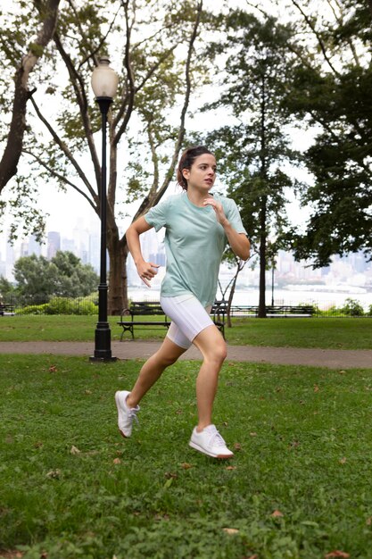 Young woman tolerating the heat wave outdoors