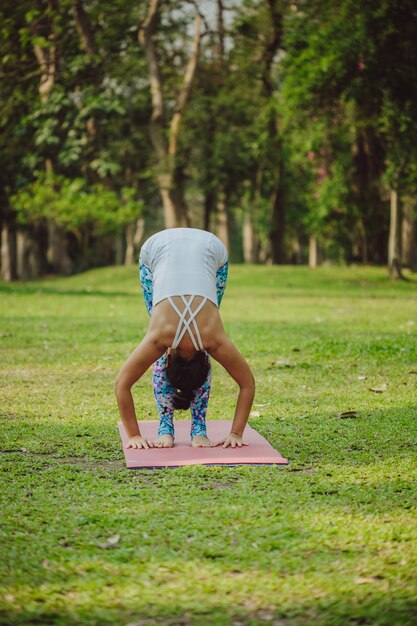 Young woman training in the park