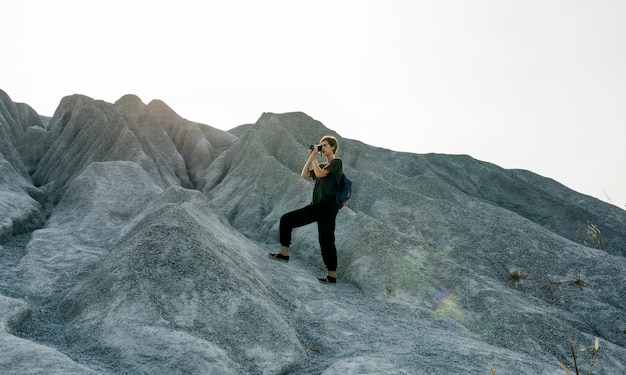 Free photo young woman travel nature concept