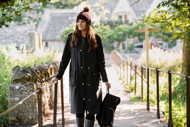 Young woman traveling alone by foot