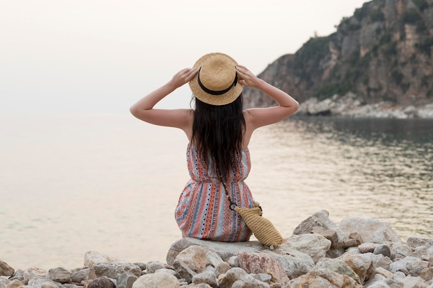 Free photo young woman traveling alone in montenegro