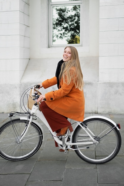 Young woman traveling by bike