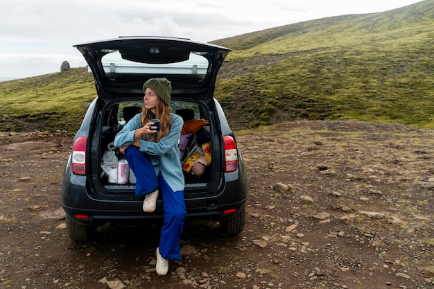 Young woman traveling in country side