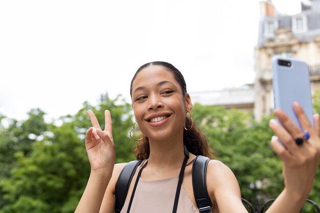 Young woman traveling and having fun in paris