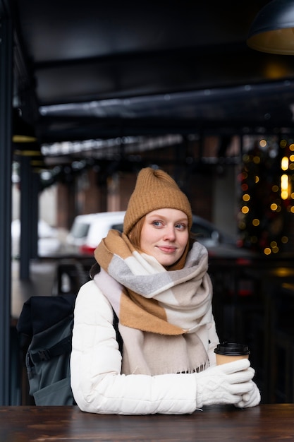 Free photo young woman traveling trough the city