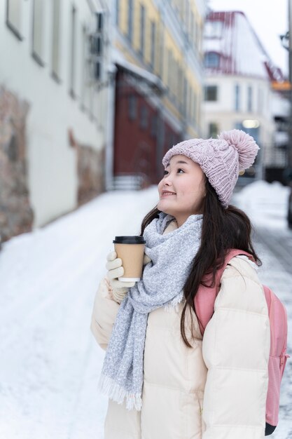 Young woman traveling trough the city