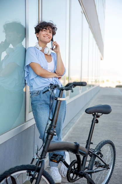 Young woman using her folding bike