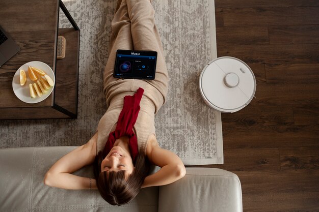 young woman using home technology