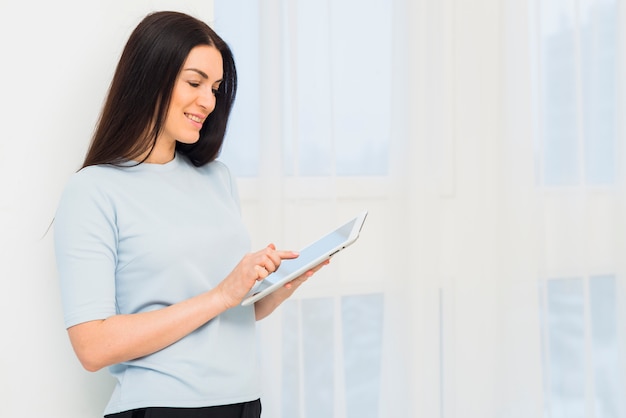 Young woman using tablet 