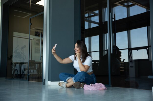 Young woman waiting for departure in airport