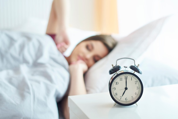 Young woman waking up