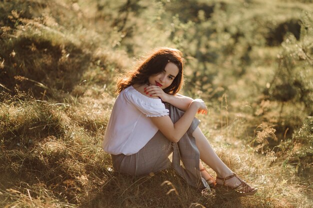 Young woman walking in forest