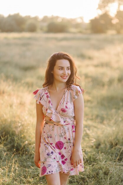 Young woman walking in forest