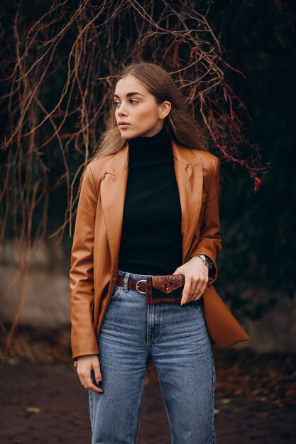 Young woman walking in park