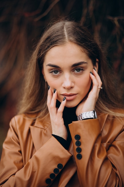 Young woman walking in park