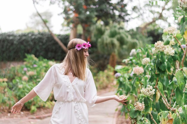 Young woman walking in the park