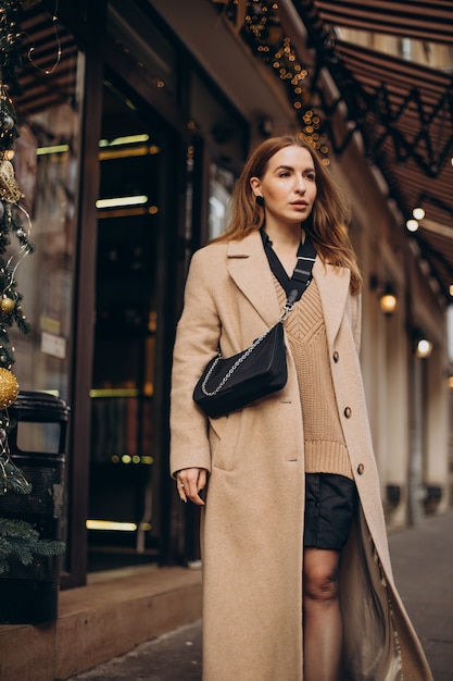 Young woman walking in the street