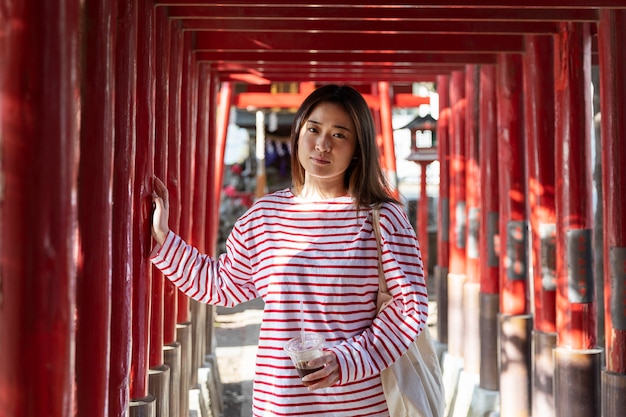 Young woman walking through the neighborhood