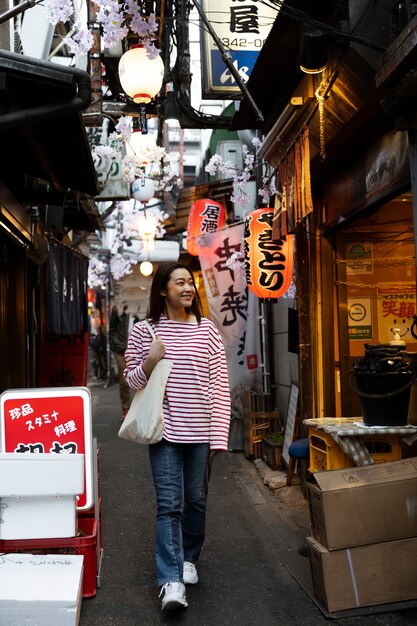 Young woman walking through the neighborhood