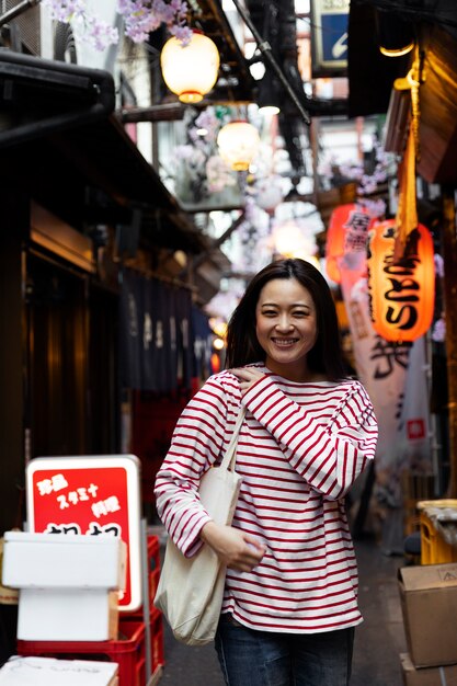 Young woman walking through the neighborhood