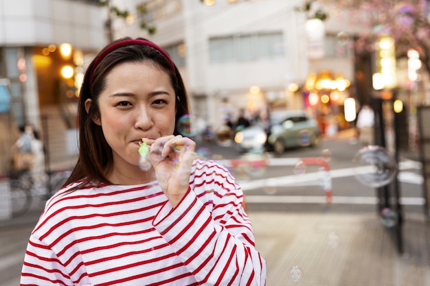 Young woman walking through the neighborhood