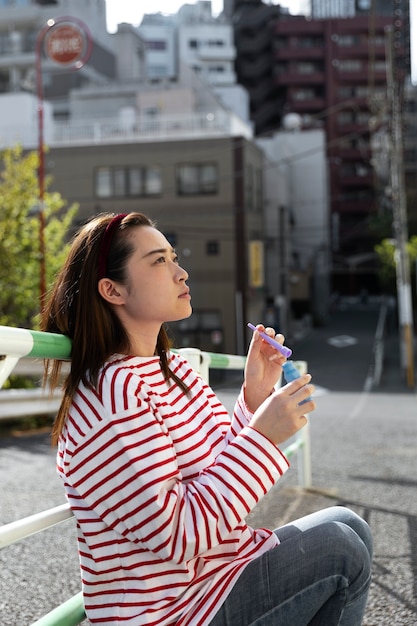 Young woman walking through the neighborhood