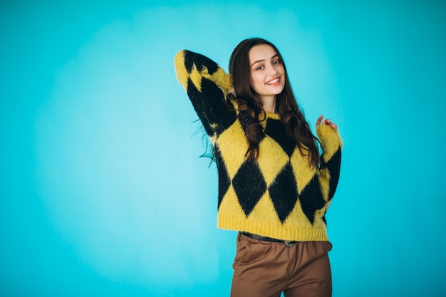 Free photo young woman in a warm sweater