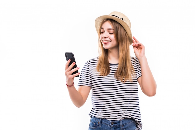 Young woman wear in straw hat and sunglasses making a video call