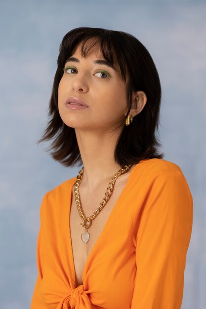 Young woman wearing chain necklace