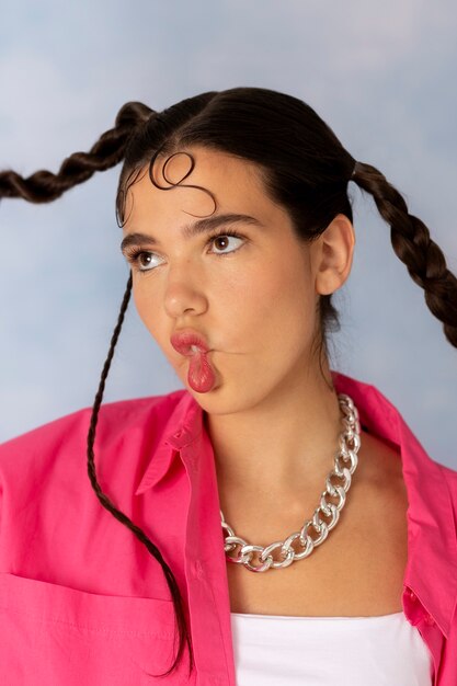 Young woman wearing chain necklace