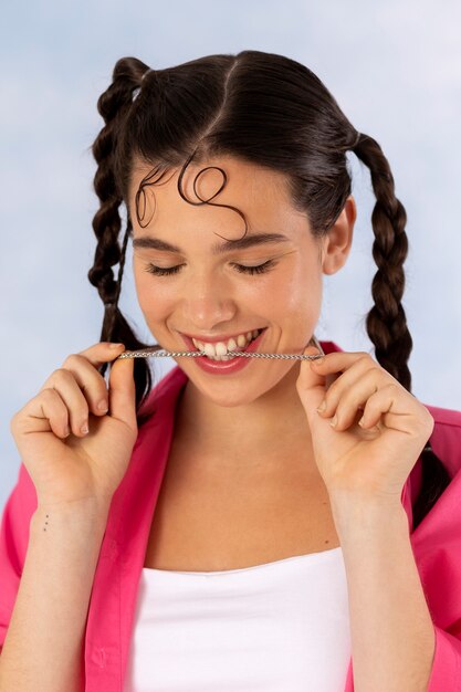 Young woman wearing chain necklace